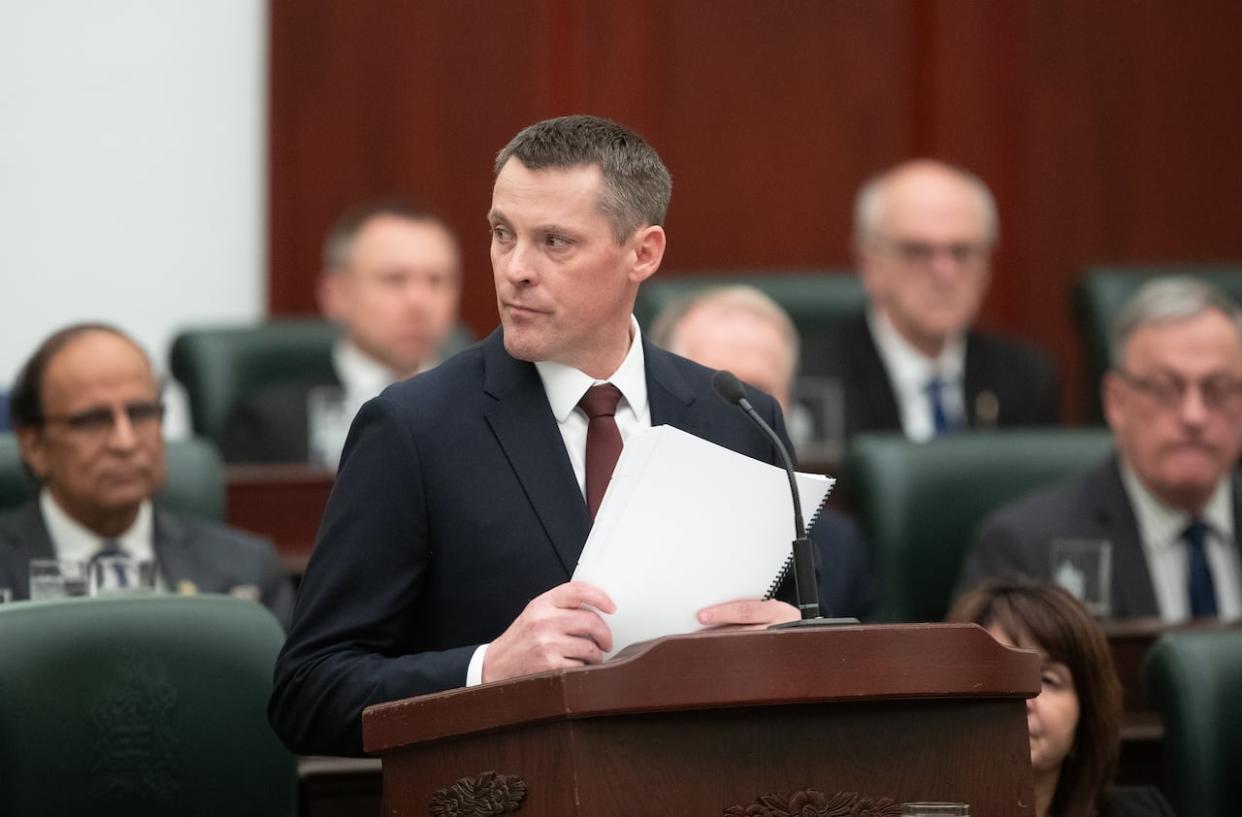Alberta Finance Minister Nate Horner delivers the 2024 budget in Edmonton on Thursday, Feb. 29, 2024. Alberta's newly released budget doesn't contain any new funding for the long-promised South Edmonton Hospital project. (Jason Franson/The Canadian Press - image credit)