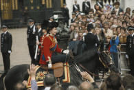 <p>The Queen riding sidesaddle on 'Burmese' during the Trooping the Colour ceremony on Horse Guards Parade on 13 June 1981. Six blanks were fired from a starting gun as the Queen rode past. She brought the horse under control and was unharmed. Teenager Marcus Sarjeant, who fired the shots, spent three years in prison after being convicted of treason. (Getty Images)</p> 