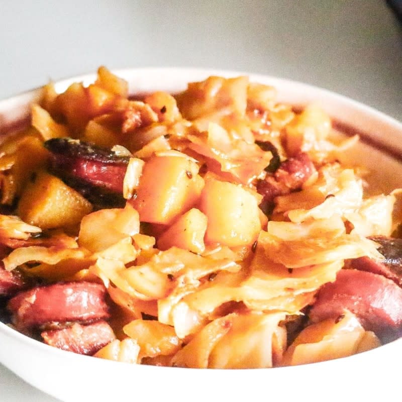 <p>We Eat At Last</p><p>Delicious Creole-spiced cabbage smothered with garlic, bacon, potatoes and sausage. This recipe is easy to make, paleo-friendly, and can be served with just about anything!</p><p><strong>Get the recipe: <a href="https://www.paleolowcarbkate.com/smothered-cabbage/" rel="nofollow noopener" target="_blank" data-ylk="slk:Smothered Cabbage;elm:context_link;itc:0;sec:content-canvas" class="link ">Smothered Cabbage</a></strong></p>