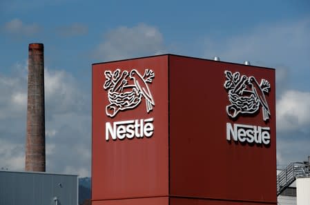 FILE PHOTO: A Nestle logo is pictured on a coffee factory in Orbe