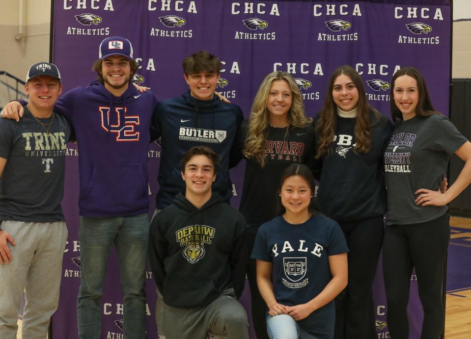 Cincinnati Hills Christian Academy athletes signed their letters of intent to play college sports Feb. 2. They are, from left: back, Griffin Max, Trine University soccer; Caden Crawford, University of Evansville baseball; Cooper Robinson, Butler University baseball; Finley Payne, Harvard University softball; Mary Jones, Palm Beach Athletic University volleyball; Ava Kraft, Taylor University volleyball; front, Will Murphy, DePauw University baseball and Jessey Li, Yale University swimming.