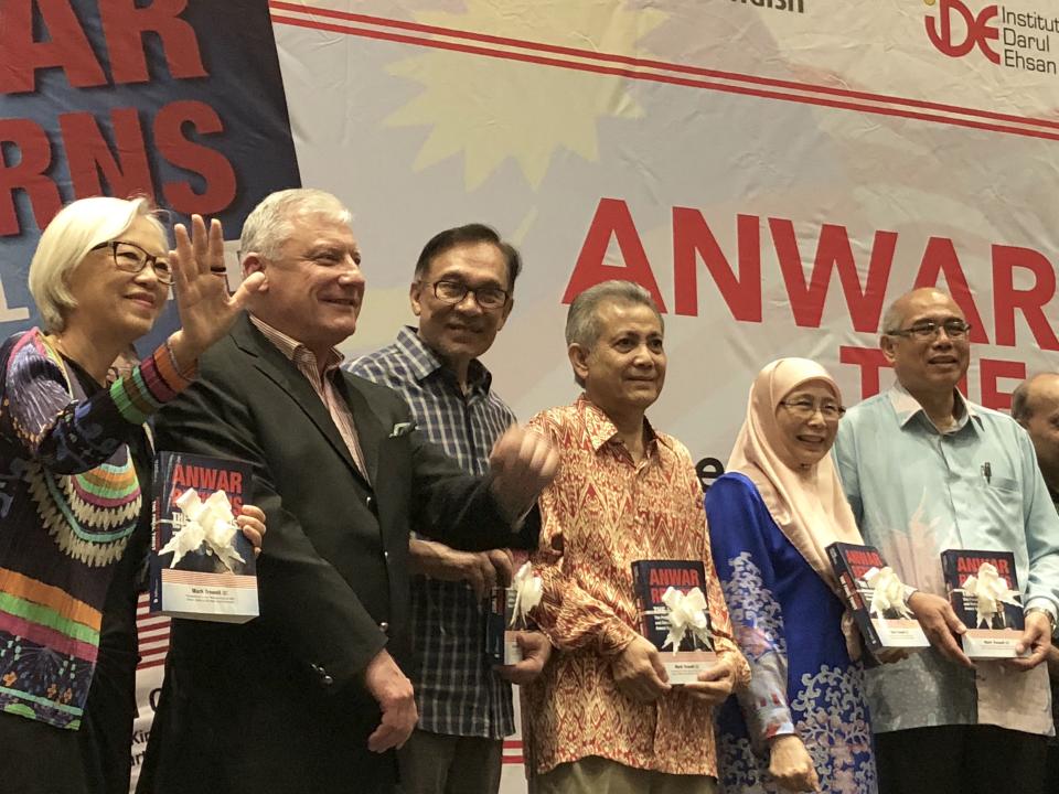 Australia criminal lawyer and author Mark Trowell (second from left) stands next to Parti Keadilan Rakyat leader Anwar Ibrahim, at the Kuala Lumpur launch of “Anwar Returns: The FInal Twist” on Sunday, 26 June 2018. PHOTO: Nicholas Yong/Yahoo News Singapore