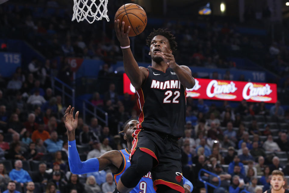 Miami Heat forward Jimmy Butler (22) goes to the basket in front of Oklahoma City Thunder center Nerlens Noel (9) during the first half of an NBA basketball game Friday, Jan. 17, 2020, in Oklahoma City. (AP Photo/Sue Ogrocki)