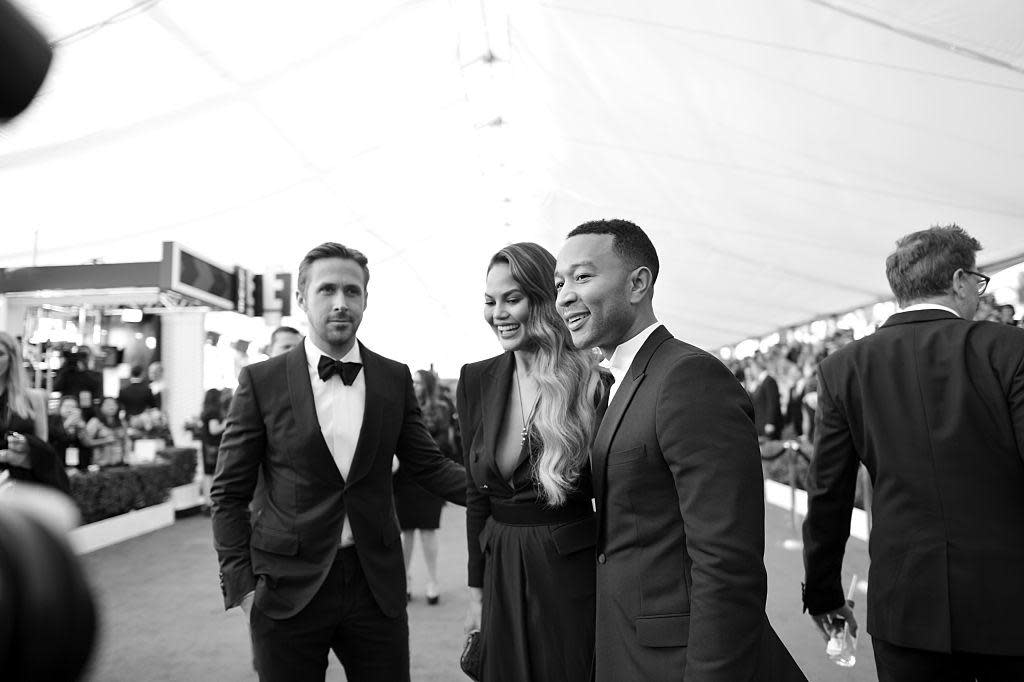 John Legend with Chrissy Teigan and Ryan Gosling at the 23rd annual Screen Actors Guild Awards, January 2017: Getty Images