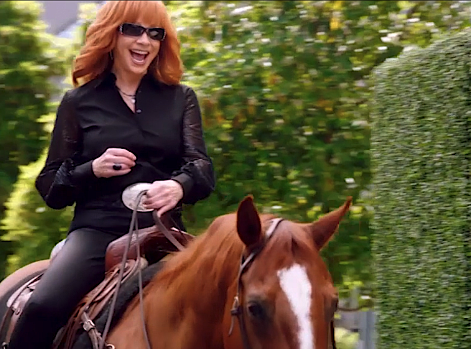Reba McEntire arrives on horseback to 'The Voice' Season 24 premiere. (NBC)