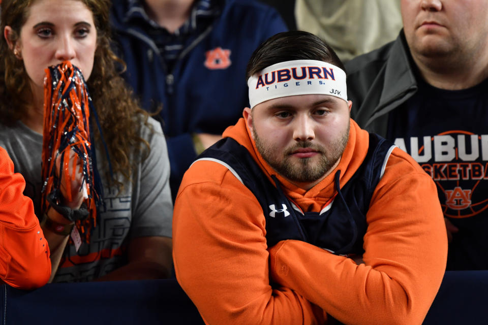 MINNEAPOLIS, MINNESOTA - APRIL 06: An Auburn Tigers fan reacts to the loss of the semifinal game in the NCAA Men's Final Four at U.S. Bank Stadium on April 06, 2019 in Minneapolis, Minnesota. (Photo by Josh Duplechian/NCAA Photos via Getty Images)