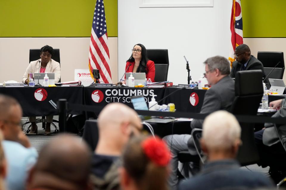 Columbus School Board listen to public comment about the potential closing of schools.