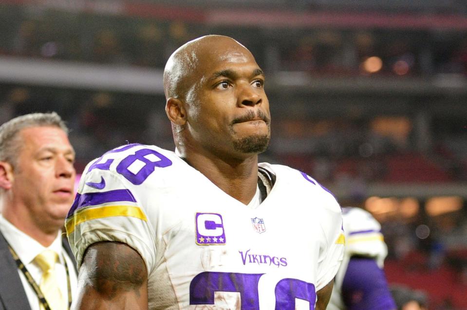 Minnesota Vikings running back Adrian Peterson looks on after losing 23-20 to the Arizona Cardinals at University of Phoenix Stadium on Dec. 10, 2015.