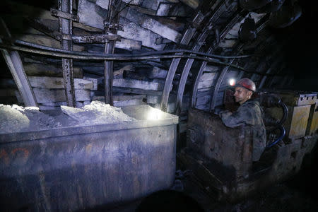 A miner works inside the Novovolynska-9 coal mine in Novovolynsk, Ukraine August 2, 2018. Picture taken August 2, 2018. REUTERS/Valentyn Ogirenko