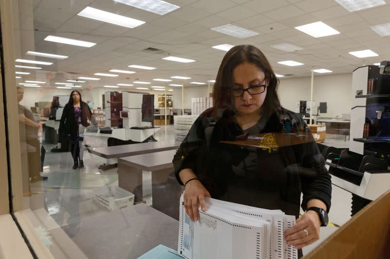 FILE PHOTO: Voters cast their ballot in the Democratic primary in Sun City