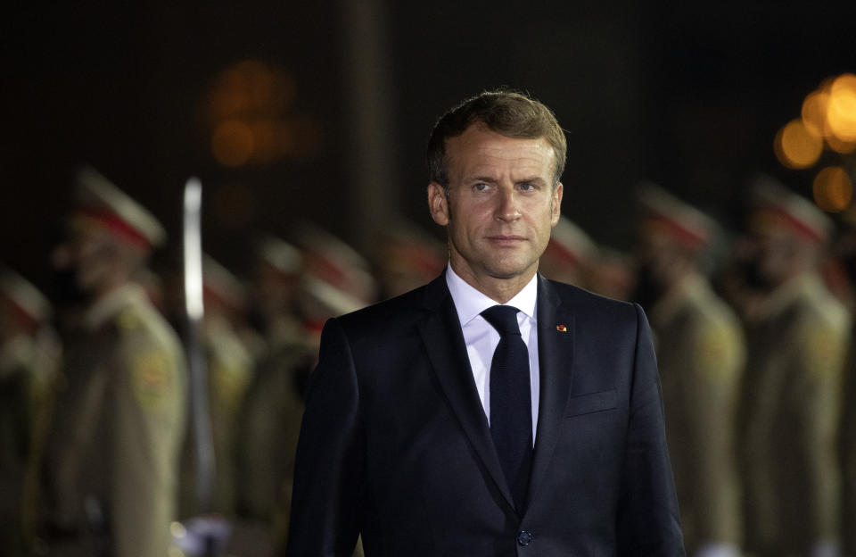 French President Emmanuel Macron arrives at Irbil international airport, Iraq, early Sunday, Aug. 29, 2021. (AP Photo/Hadi Mizban)