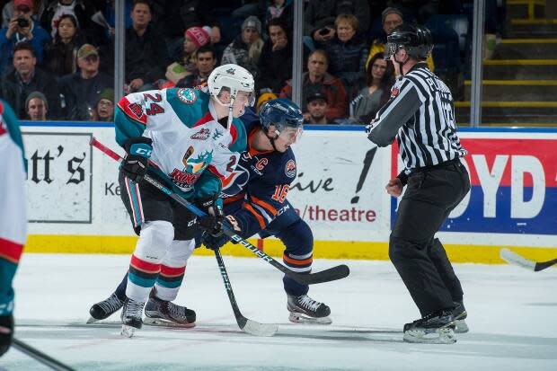 The Kelowna Rockets and Kamloops Blazers face off in a 2017 game. On Tuesday, the WHL cleared the Rockets to resume team activities after all the players who tested positive in March, tested negative this week. (Marissa Baecker/Getty Images - image credit)