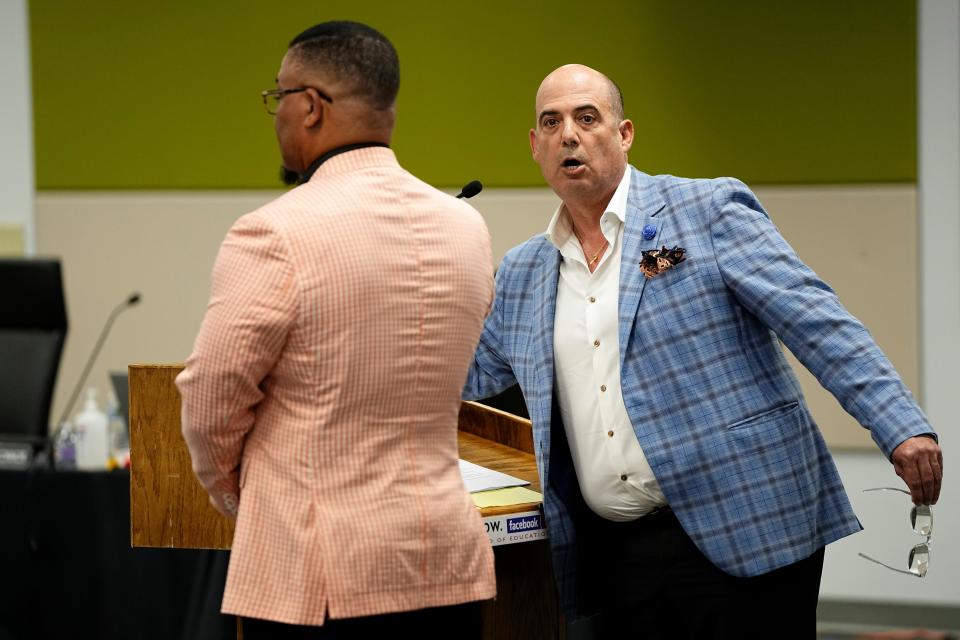 Jun 25, 2024; Columbus, Ohio, USA; Al Edmondson and Jim Negron present their list of schools for closure as members of the task force charged with school consolidation during a meeting of the Columbus City Schools board.