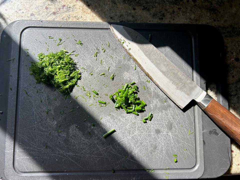 Chopping ingredients for Gordon Ramsay's 10-minute omelette