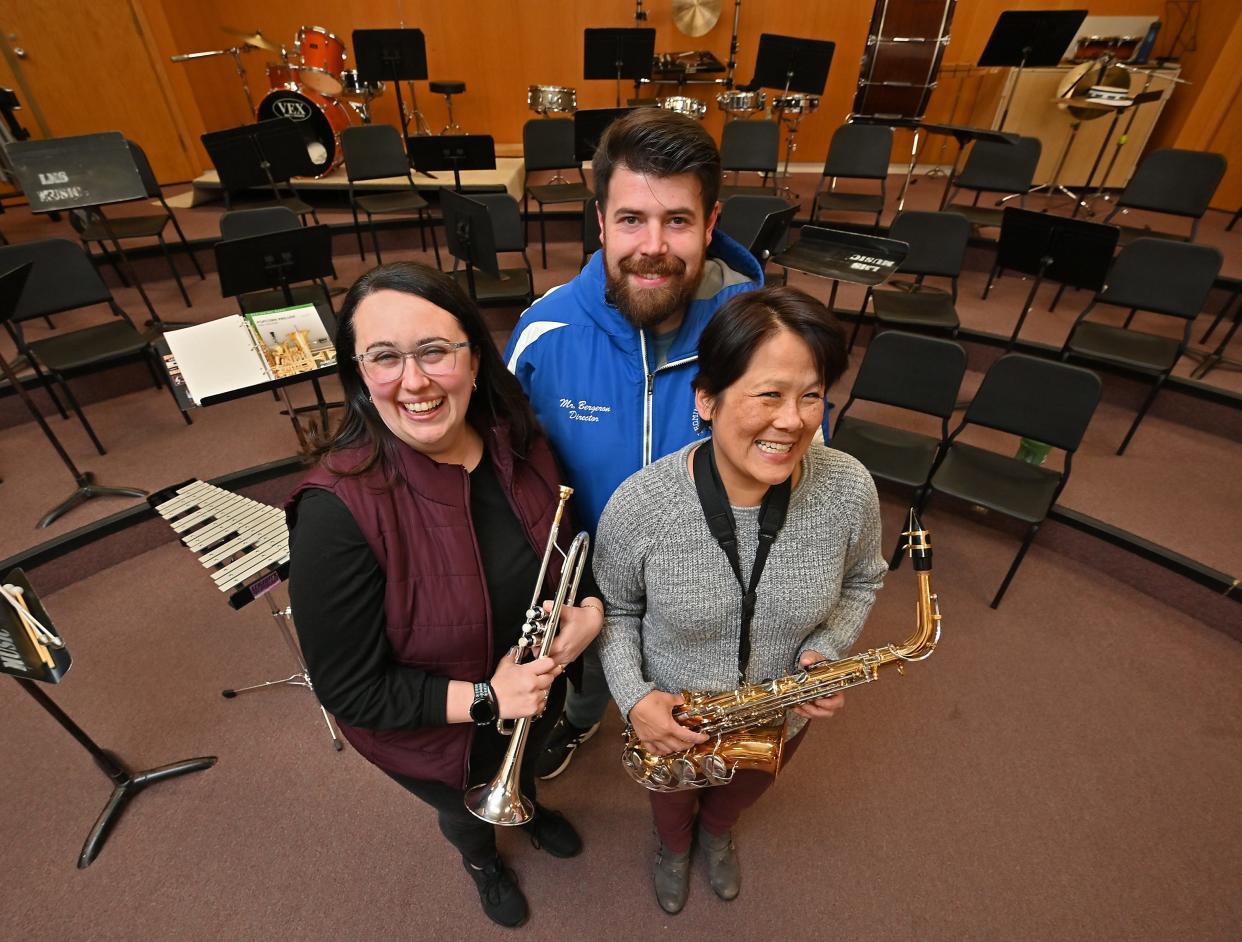 Kristina Looney (Leicester Middle School, trumpet), Bobby Bergeron (Leominster High School, tuba), and Angie Crockwell (Marlborough High School, alto saxophone) will march at the 2023 Macy's Thanksgiving Day Parade.