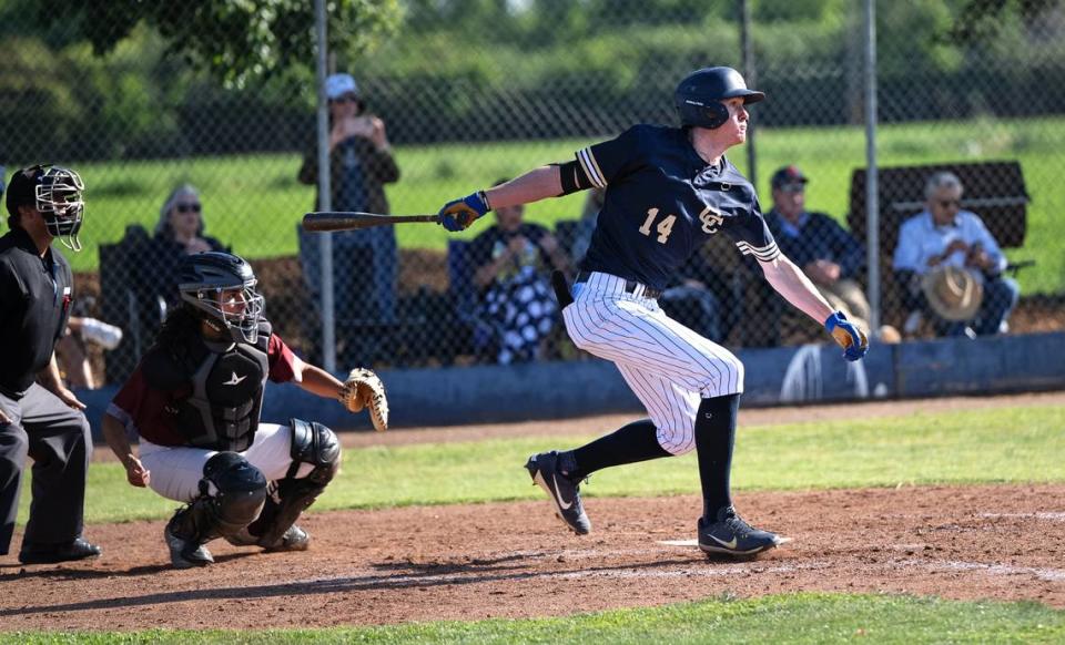 Central Catholic’s Wesley Payne drives a base hit during the Sac-Joaquin Section baseball Division III playoff game with Weston Ranch at Central Catholic High School in Modesto, Calif., Tuesday, May 8, 2024.