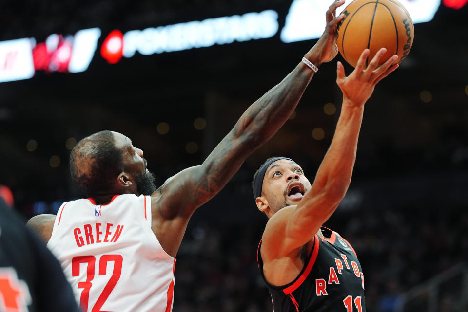 Houston Rockets forward Jeff Green (32) blocks a shot from Toronto Raptors forward Bruce Brown (11) during the second half of an NBA basketball game Friday, Feb. 9, 2024, in Toronto. (Frank Gunn/The Canadian Press via AP)