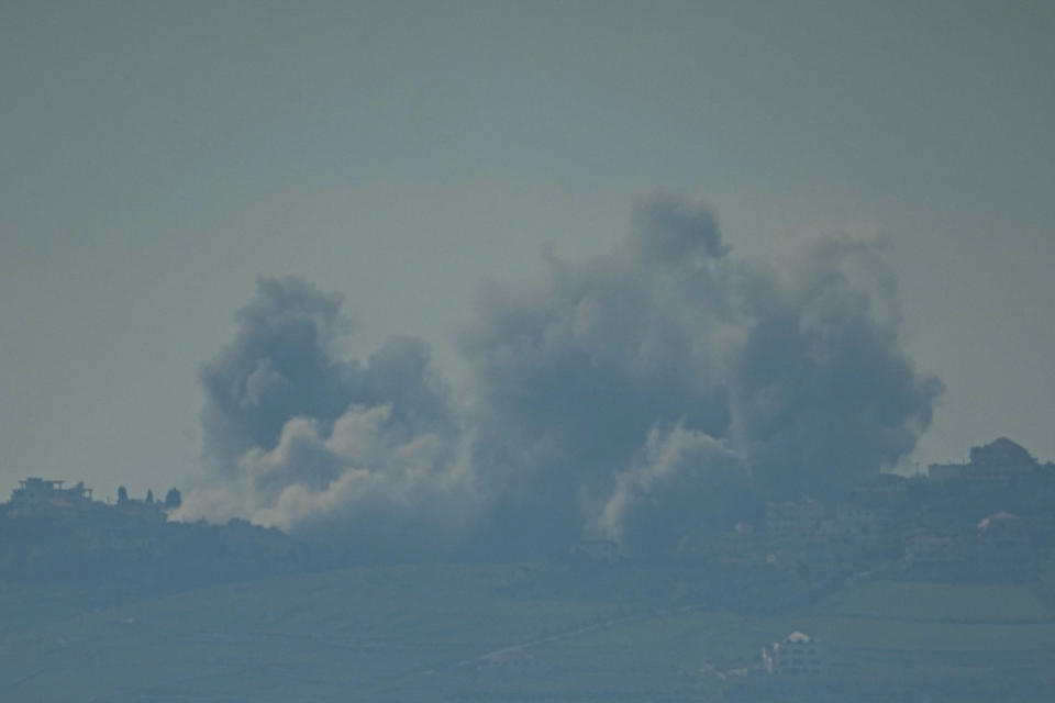 Smoke rises following an Israel military bombardment in southern Lebanon as seen from northern Israel, Thursday, Feb. 15, 2024. (AP Photo/Ariel Schalit)