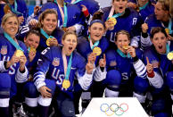 <p>Gold medal winners the United States celebrate after defeating Canada in a shootout in the Women’s Gold Medal Game at the PyeongChang 2018 Winter Olympic Games on February 22, 2018.<br> (Photo by Bruce Bennett/Getty Images) </p>