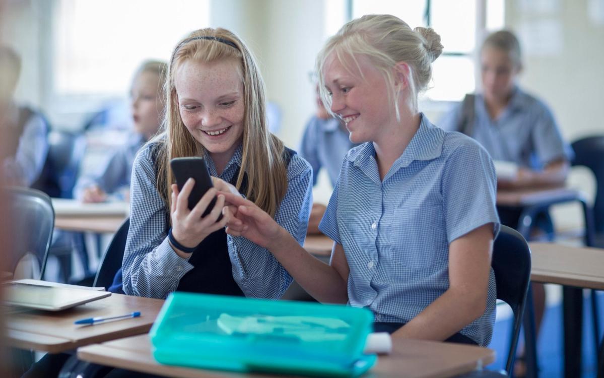 Getting a mobile phone is a ‘rite of passage’ for children, says schools minister