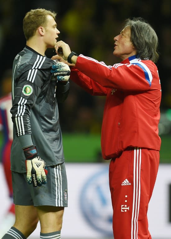 Bayern Munich's team doctor Hans-Wilhelm Mueller-Wohlfahrt (right) resigned after being blamed for a 3–1 loss at Porto in the Champions League