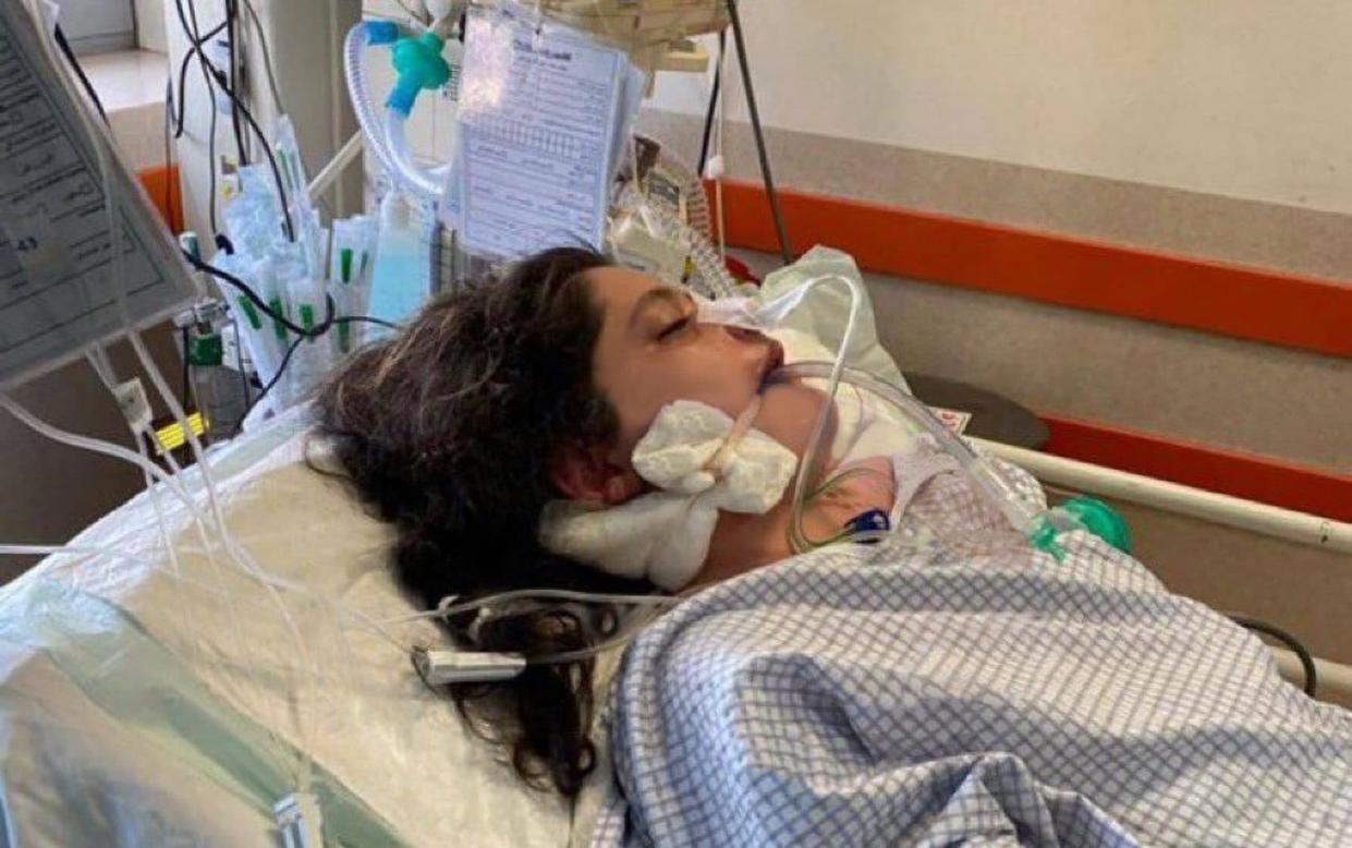 Mahsa Amin on a hospital bed after being arrested in Tehran by the Islamic republic's so-called ‘morality police’ - Newsflash