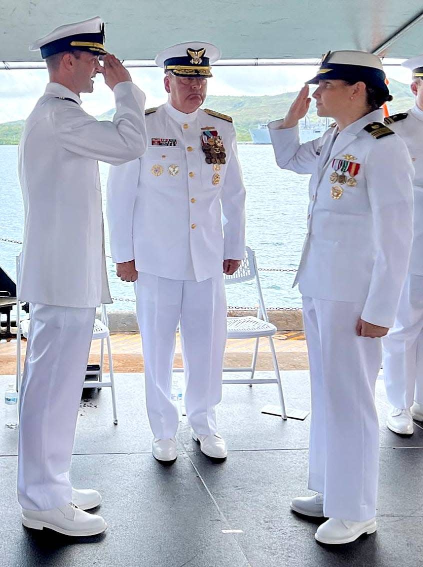 Cmdr. Linden Dahlkemper, far right, relieves Cmdr. Ryan Adams, far left, as the USCGC Sequoia (WLB 215) commanding officer during a change of command ceremony on July 15, 2022.