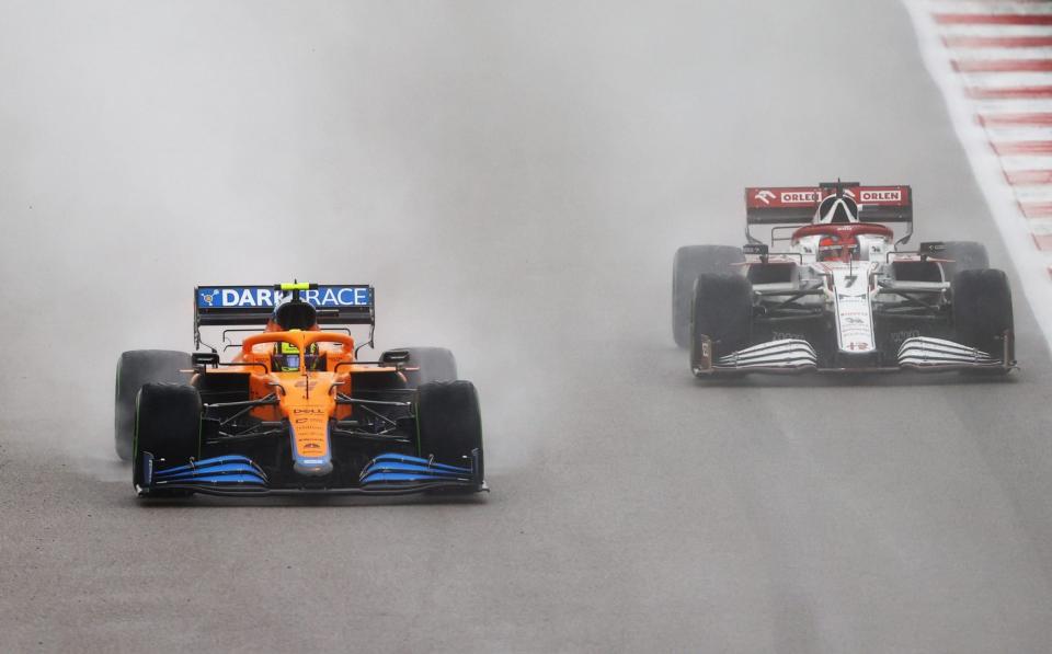 Lando Norris of Great Britain driving the (4) McLaren F1 Team MCL35M Mercedes and Kimi Raikkonen of Finland driving the (7) Alfa Romeo Racing C41 Ferrari during the F1 Grand Prix of Russia at Sochi Autodrom on September 26, 2021 in Sochi, Russia - Getty Images Europe 