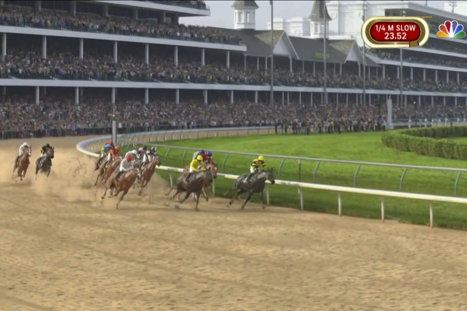 In this image taken from video provided by NBC Sports, the field rounds the first turn in a computer-simulated version of the Kentucky Derby horse race between the 13 winners of the Triple Crown, Saturday, May 2, 2020, in Louisville, Ky. Secretariat won the race, which was part of NBC's substitute programming after the Kentucky Derby was postponed by the coronavirus pandemic. (NBC Sports via AP)