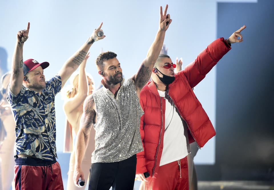 Residente, from left, Ricky Martin and Bad Bunny perform "Cantalo" at the 20th Latin Grammy Awards on Thursday, Nov. 14, 2019, at the MGM Grand Garden Arena in Las Vegas. (AP Photo/Chris Pizzello)