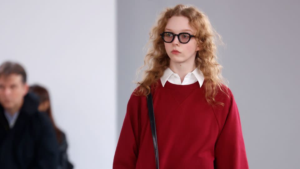 Some models at the Undercover show sported bags of groceries as a nod to the multiple roles taken on by working mothers. - Thierry Chesnot/Getty Images