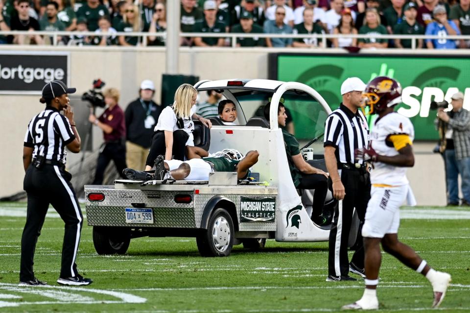 Michigan State's Alante Brown is driven off the field after the opening kickoff against Central Michigan during the first quarter on Friday, Sept. 1, 2023, at Spartan Stadium in East Lansing.