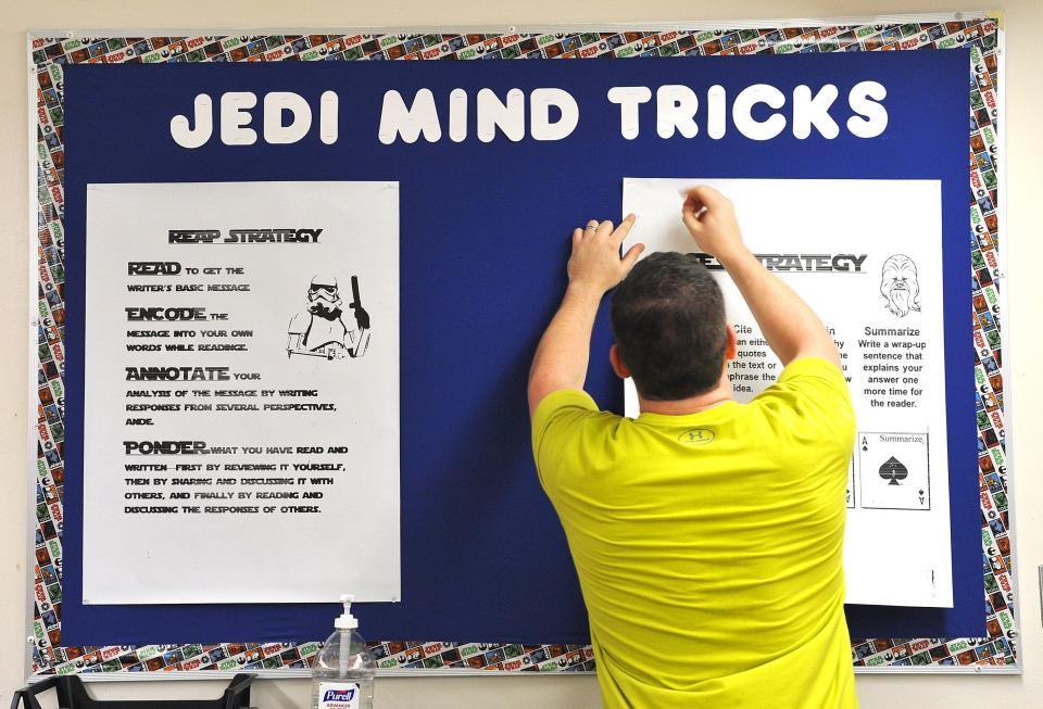 English teacher Jordan Chambers posts reading and writing strategies under the heading "Jedi Mind Tricks" in this photo from 2016, when Wolfson High began its evolution into an International Baccalaureate dedicated magnet for Advanced International Studies and Leadership.