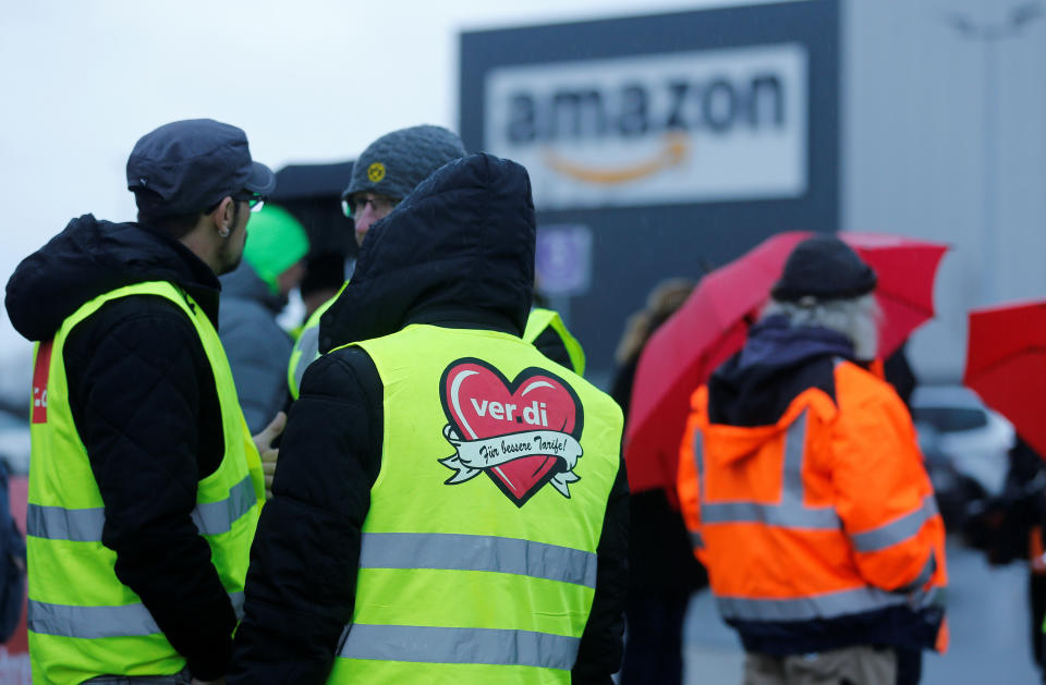 Workers and Verdi Union members are seen during strike action at an Amazon logistics centre in Werne, Germany, December 17, 2018. REUTERS/Leon Kuegeler