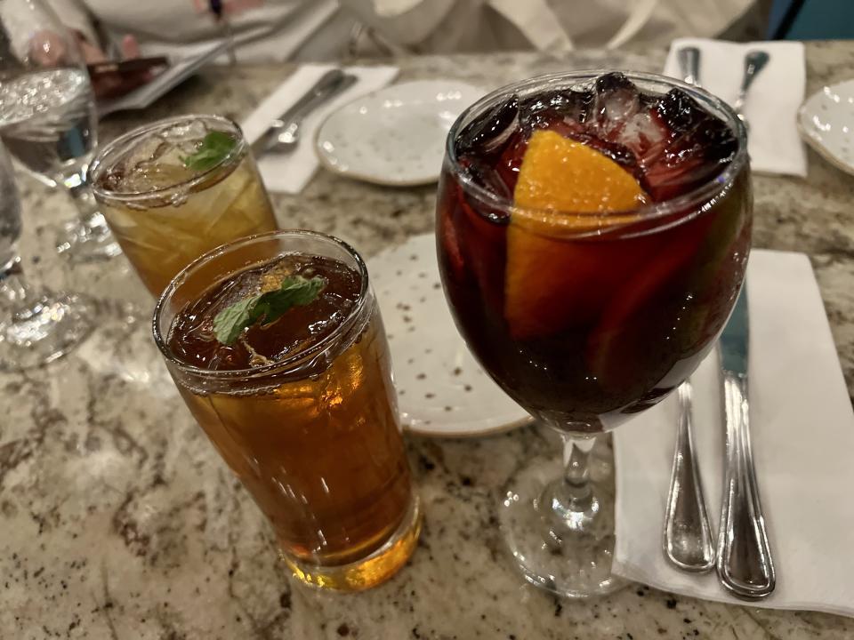 Red sangria and Iced Mint Tea, both made with gin, at Spice Road Table. (Photo: Terri Peters)