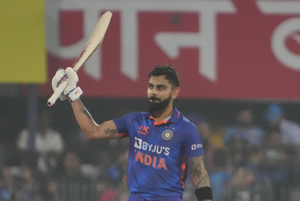 India's Virat Kohli celebrates scoring a century during the first one-day international cricket match between India and Sri Lanka in Guwahati, India, Tuesday, Jan. 10, 2023.(AP Photo/Anupam Nath)