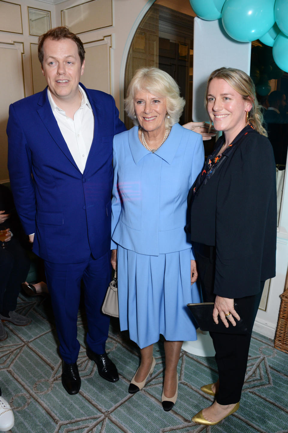 Tom Parker Bowles, Camilla, Duchess of Cornwall and Laura Lopes attend the launch of the 