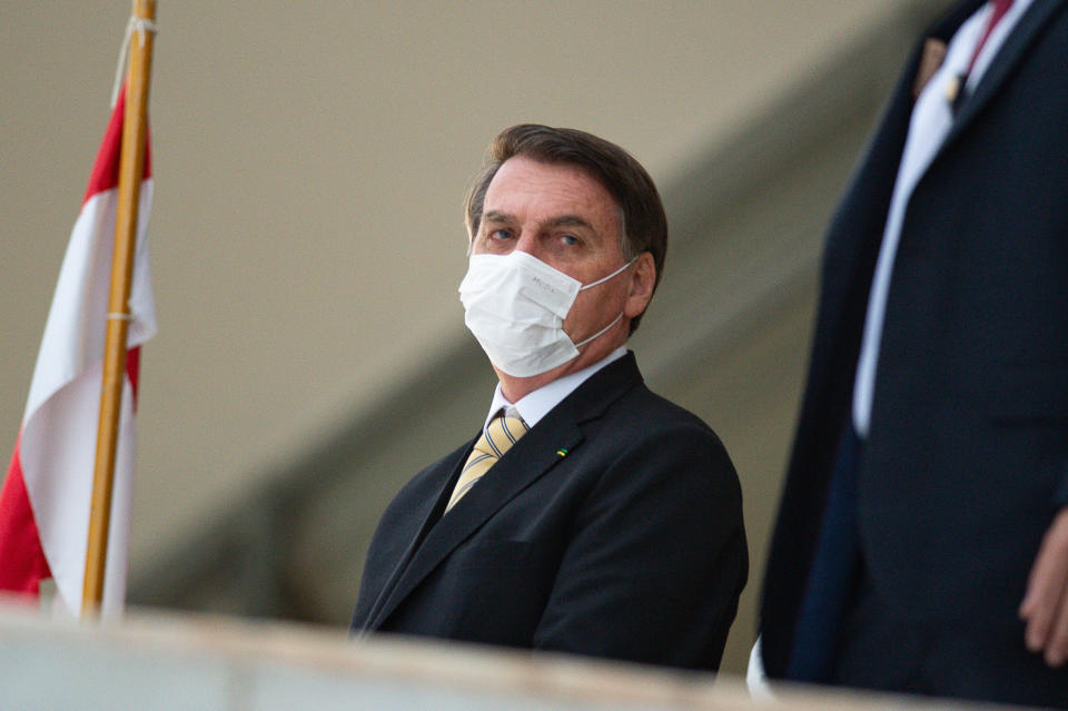Brazilian President Jair Bolsonaro's lax response to the coronavirus outbreak ensured his country's crisis would be worse than it should have been. (Photo: Andressa Anholete via Getty Images)