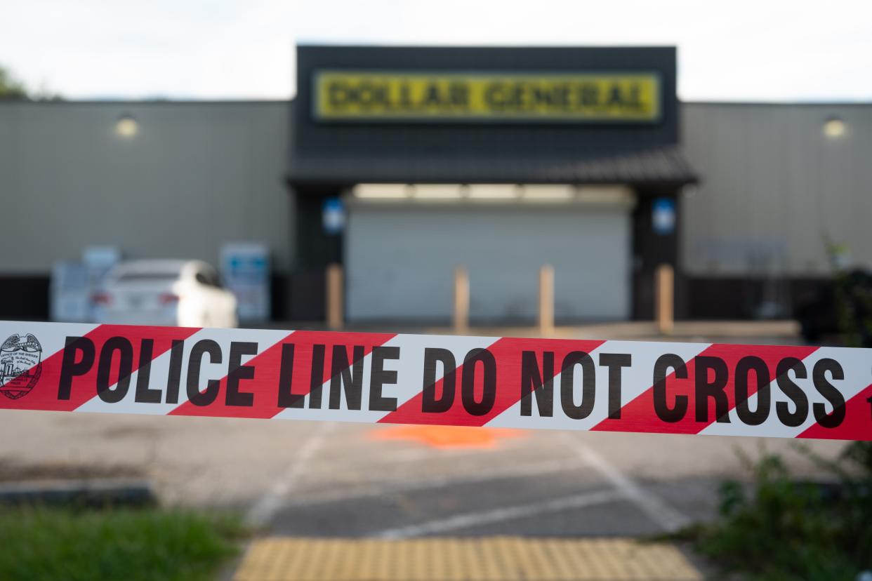 Crime scene tape stretches across the property of a Dollar General store where three people were shot and killed two days earlier on August 28, 2023 in Jacksonville, Florida. (Getty Images)