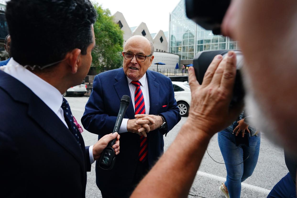 Rudy Giuliani walks into the Fulton County Courthouse to appear before a grand jury aiding in the Fulton County district attorney’s investigation. Giuliani is a target of the ongoing criminal investigation into Georgia’s 2020 elections.