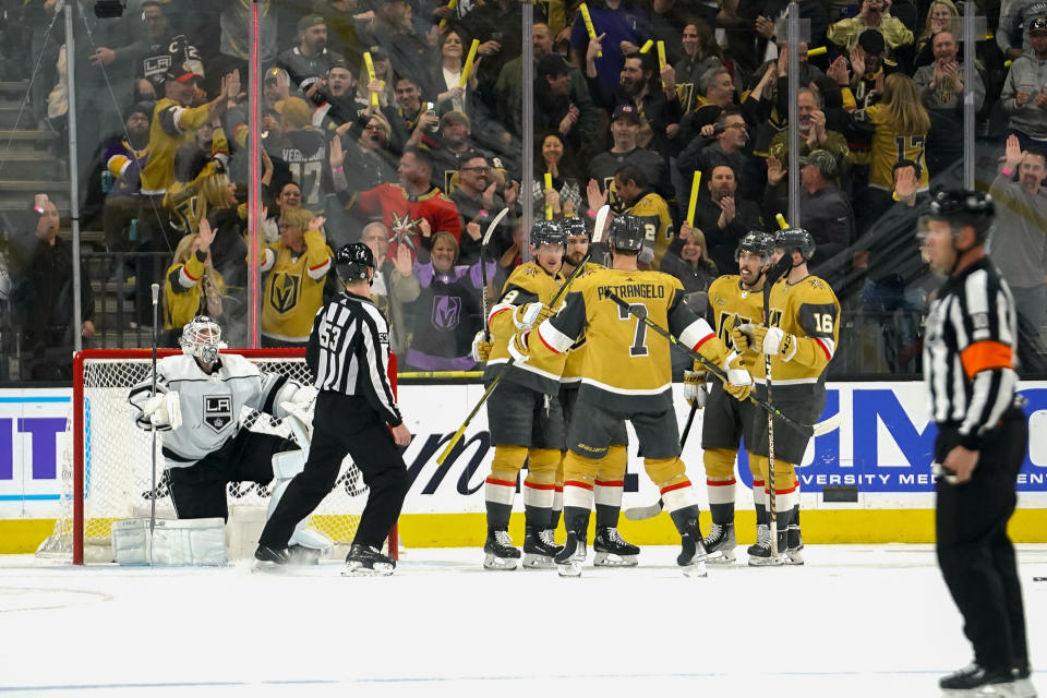 The Vegas Golden Knights celebrate after scoring a goal against the Los Angeles Kings during the first period of an NHL hockey game Thursday, April 6, 2023, in Las Vegas. (AP Photo/Lucas Peltier)