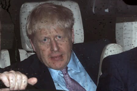 PM hopeful Boris Johnson leaves Parliament in London