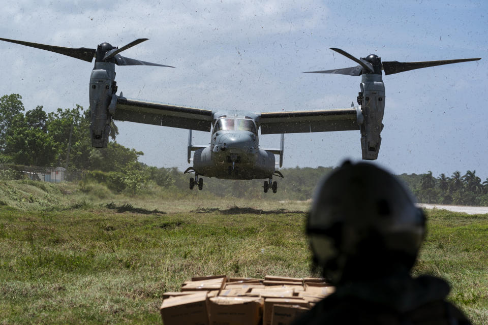 A VM-22 Osprey, with a load of aid lands, at Jeremie Airport, Saturday, Aug. 28, 2021, in Jeremie, Haiti. The VMM-266, "Fighting Griffins," from Marine Corps Air Station New River, from Jacksonville, N.C., are flying in support of Joint Task Force Haiti after a 7.2 magnitude earthquake on Aug. 22, caused heavy damage to the country. (AP Photo/Alex Brandon)