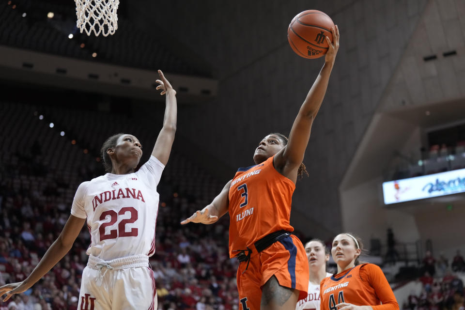 Illinois guard Makira Cook (3) shoots over Indiana guard Chloe Moore-McNeil (22) in the first half of an NCAA college basketball game in Bloomington, Ind., Sunday, Dec. 4, 2022. (AP Photo/AJ Mast)