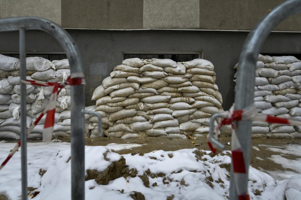 Sandbags cover windows of an apartment building in Belgorod, Russia, Friday, Jan. 26, 2024. A missile attack on the city near the Ukrainian border on Dec. 30 killed 25 and injured 109. Such attacks are dealing a blow to President Vladimir Putin’s attempts to reassure Russians that life in the country is largely untouched by the nearly 2-year-old conflict. (AP Photo)