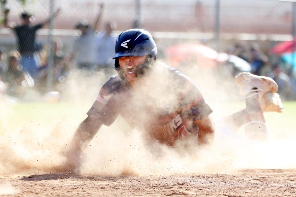 Abraham Calderon of La Quinta High scores the winning run against Monrovia in their Division 3 CIF-SS playoff game in La Quinta, Calif., on May 10, 2022.