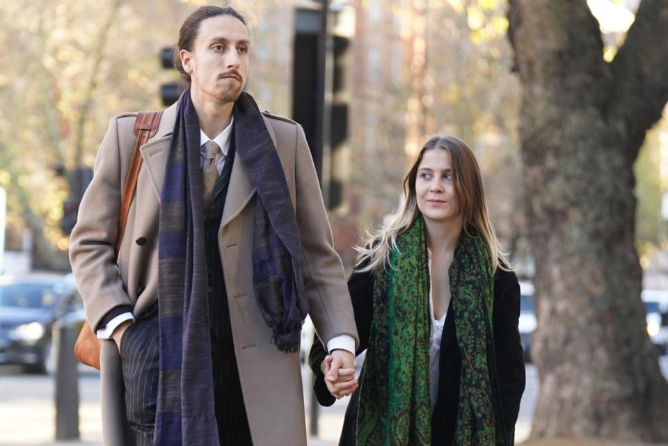 Eco-protesters Hannah Hunt (right) and Eden Lazarus arrive at Westminster Magistrates' Court (PA)