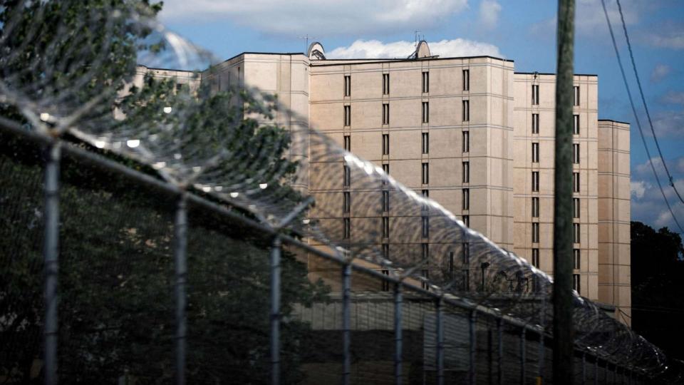 PHOTO: Wire fence is seen outside of the Fulton County Jail after a Grand Jury brought back indictments against former president Donald Trump and 18 of his allies in their attempt to overturn the state's 2020 election results in Atlanta, Aug. 16, 2023. (Dustin Chambers/Reuters)