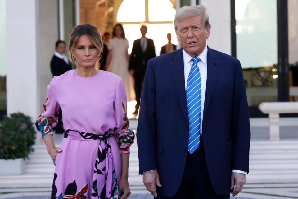 Donald and Melania Trump arrive at the Florida home of billionaire investor John Paulson (Getty)