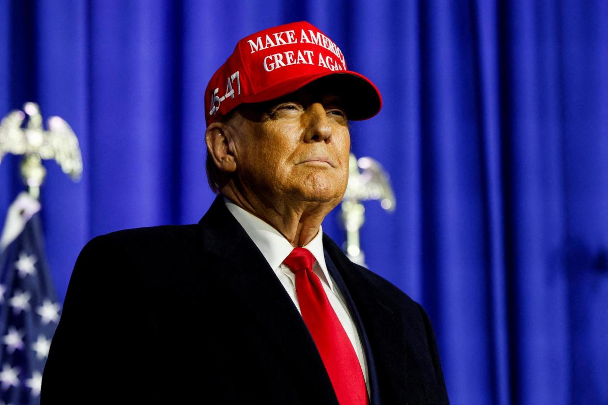 <span>Donald Trump campaigns in Waterford Township, Michigan, on 17 February.</span><span>Photograph: Rebecca Cook/Reuters</span>